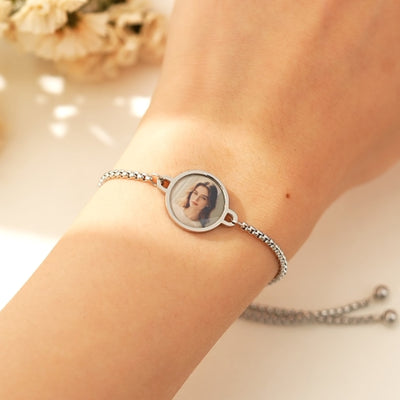 Platinum photo bracelet worn on the wrist