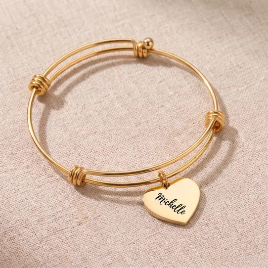 Gold Heartstrings bangle bracelet with 1 engraved heart charm