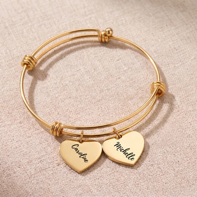 Gold Heartstrings bangle bracelet with 2 engraved heart charms