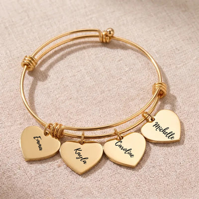 Gold Heartstrings bangle bracelet with 4 engraved heart charms