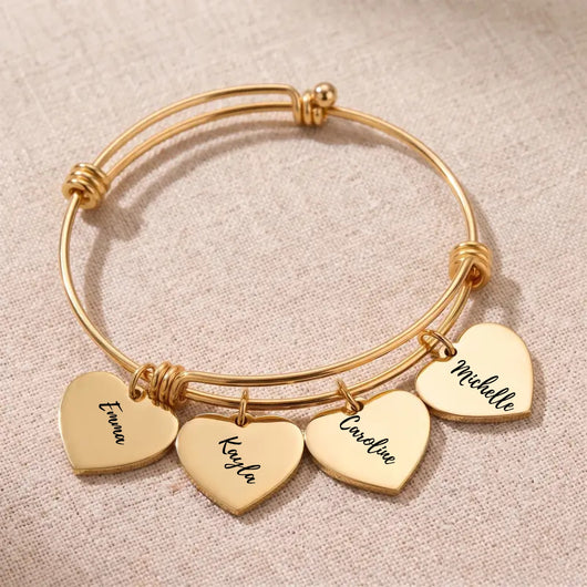 Gold Heartstrings bangle bracelet with 4 engraved heart charms