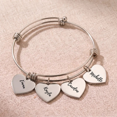 Silver Heartstrings bangle bracelet with 4 engraved heart charms